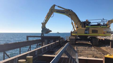 Excavator at work constructing new Windara reef